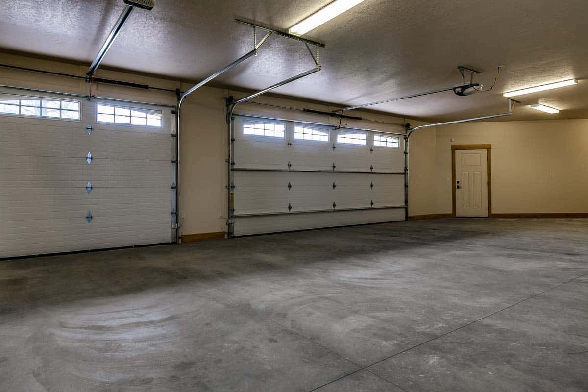 empty garage with concrete floor and door opener