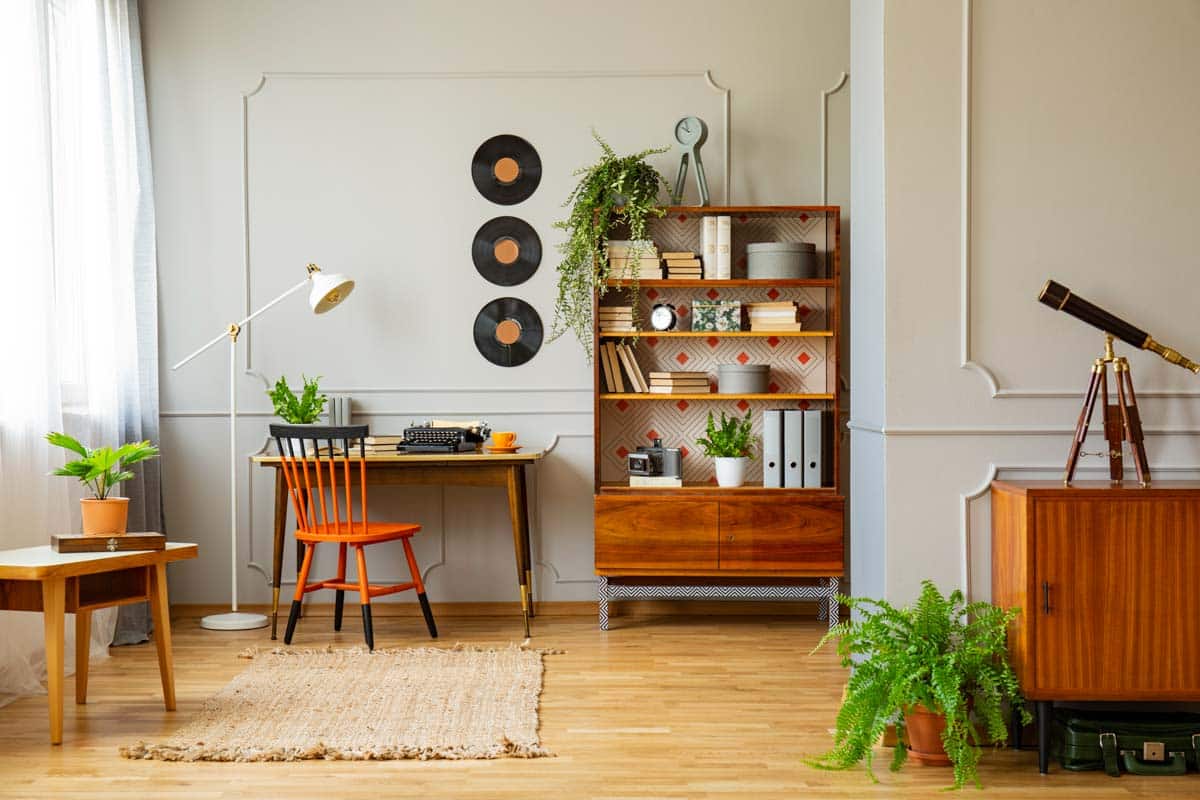 home office with shelves desk and chair