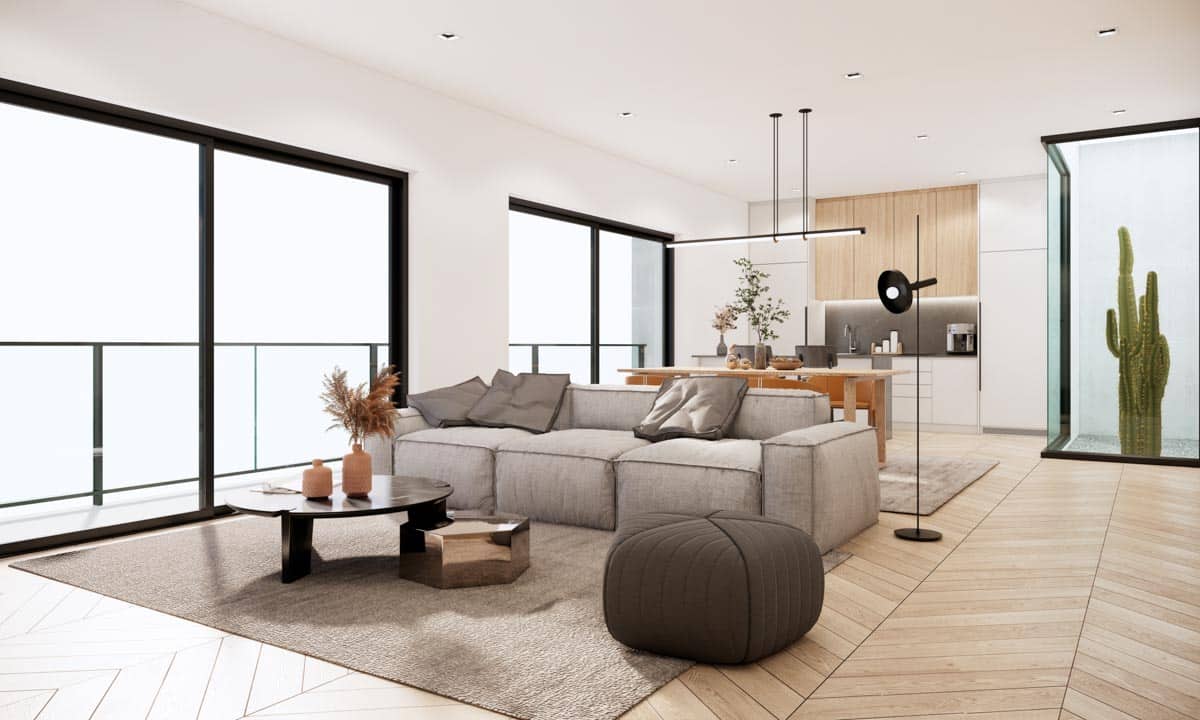 living area with sofa rug and windows