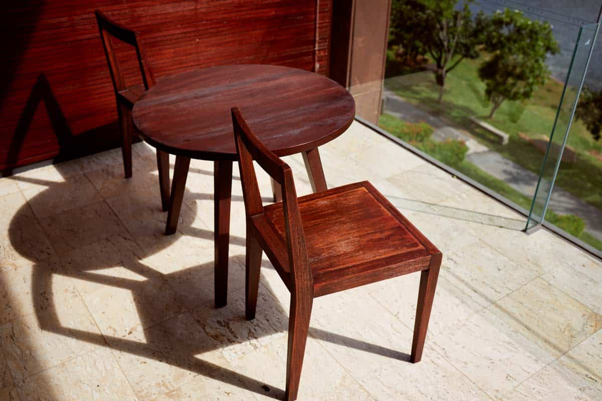 table and chairs made of koa wood