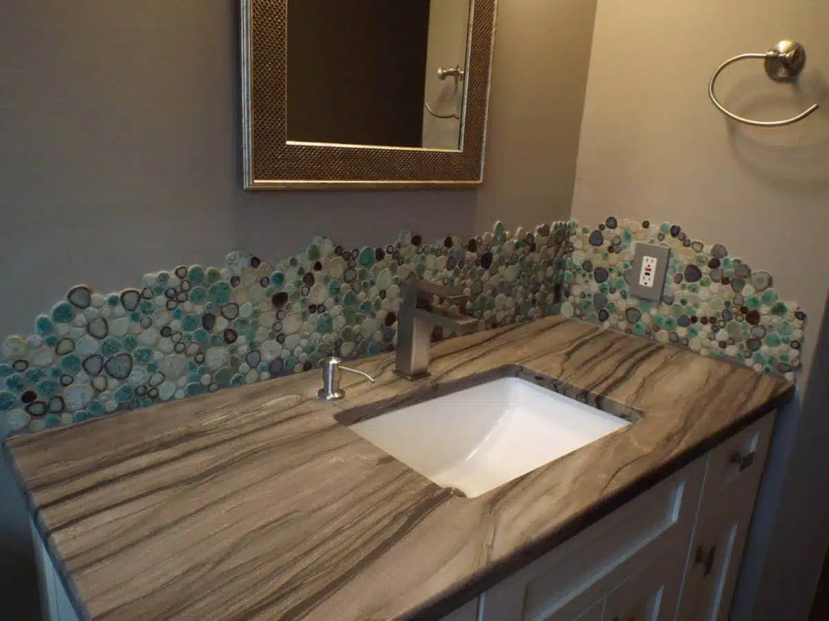 vanity with backsplash sink and countertop