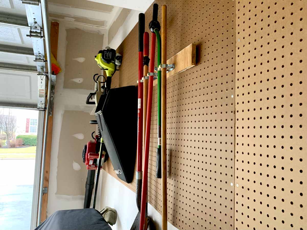 garage with tools on pegboard