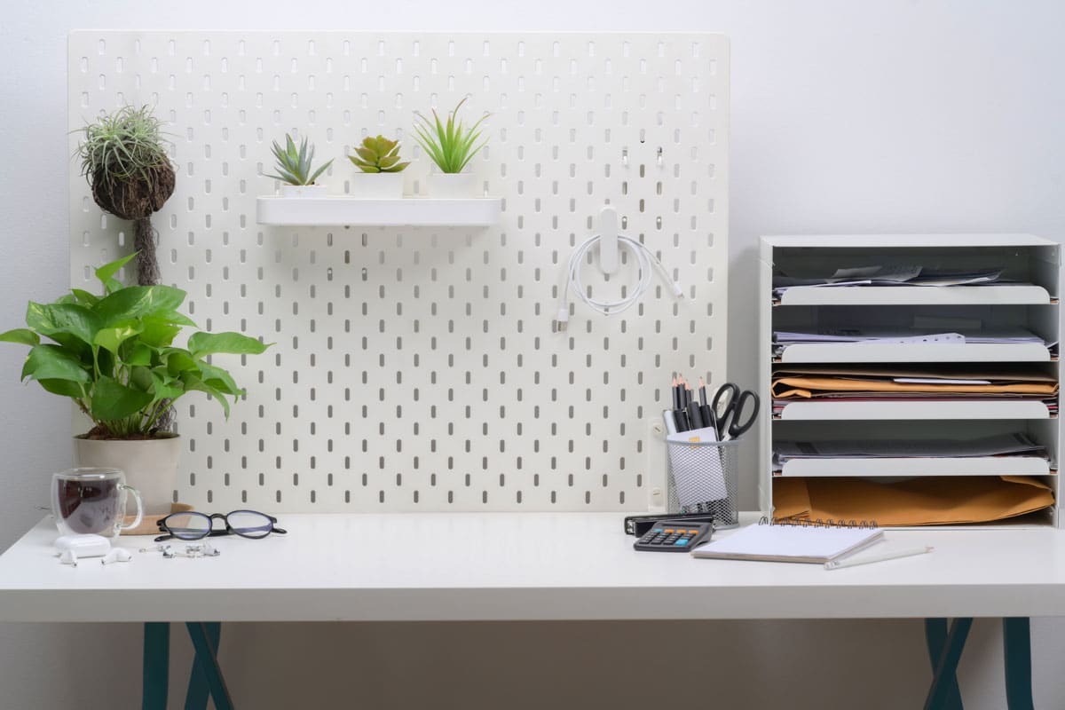 home office with plant wall