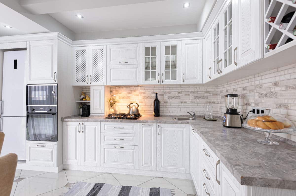 kitchen with microwave countertop and white cabinets