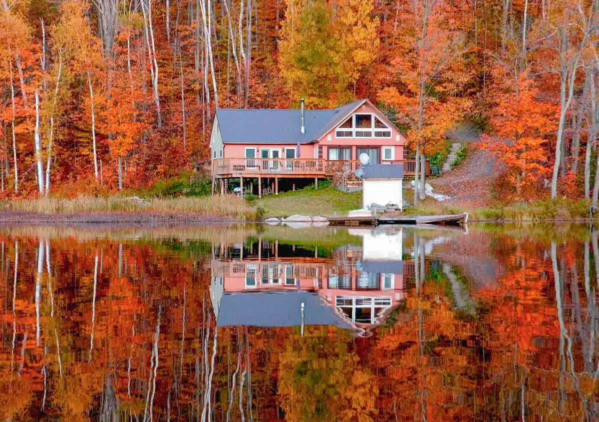 red house with deck over water