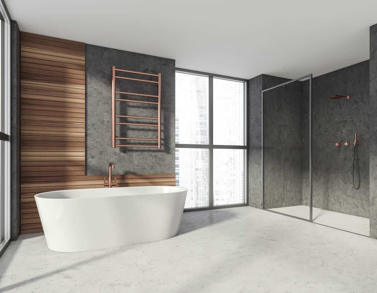 bathroom with tub shower and windows