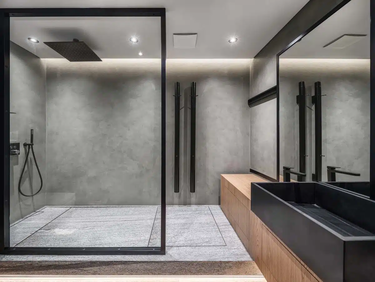 modern bathroom with gray cultured marble walk in shower