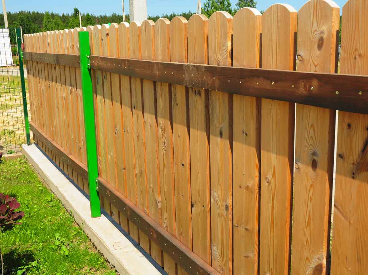 outdoor fence constructed of wood