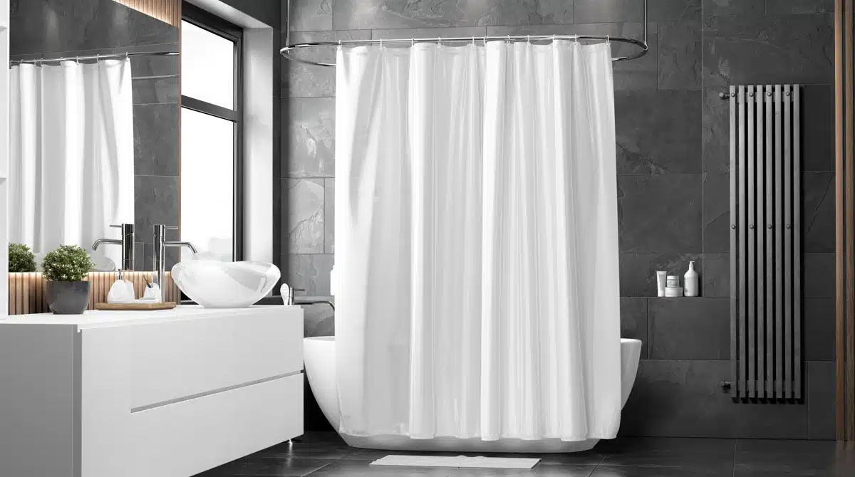 bathroom with tub mirror and windows