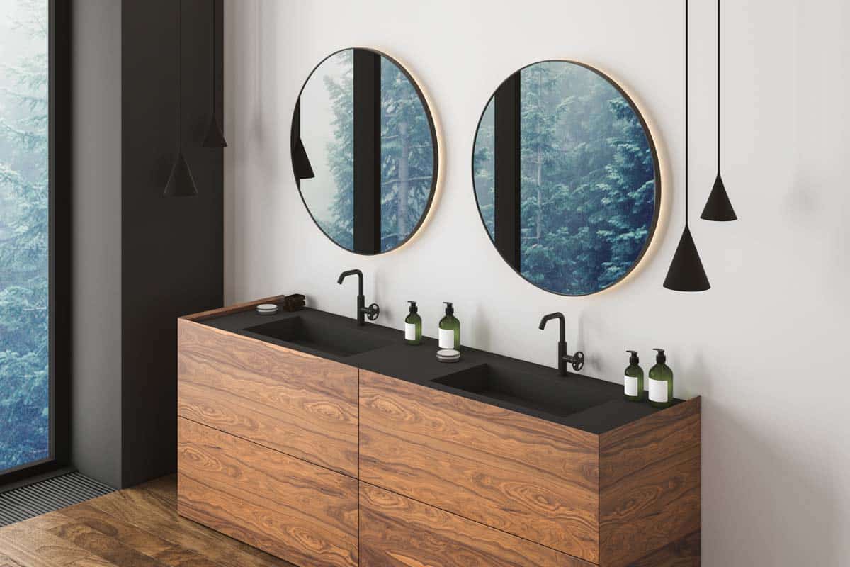 bathroom with twin mirrors and faucet