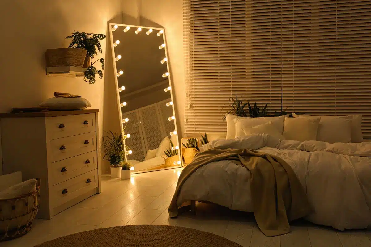 bedroom with front lit mirror