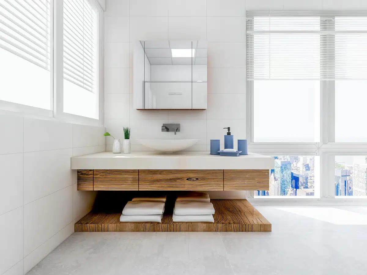 minimalist bathroom with floating vanity and mirror