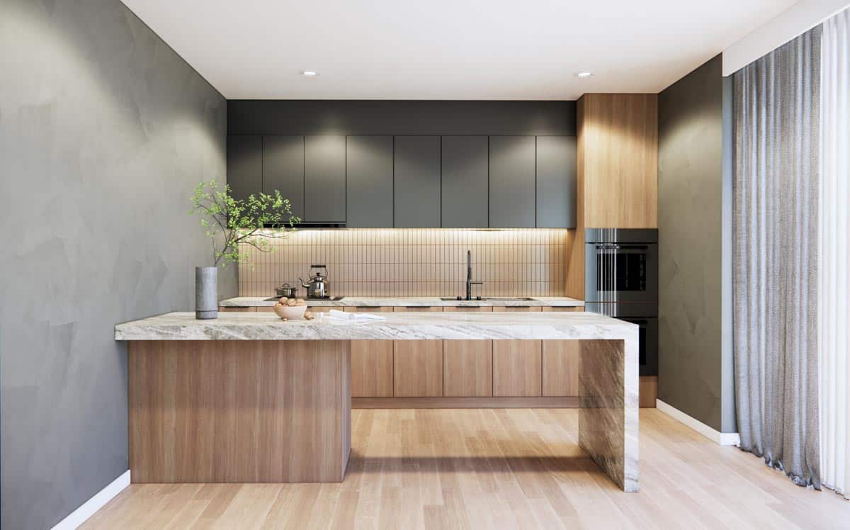 modern kitchen with cabinets and gray wall