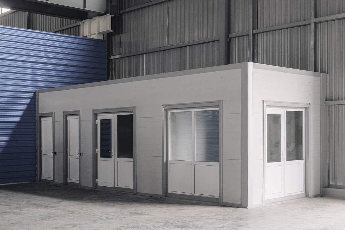 white container with windows and doors