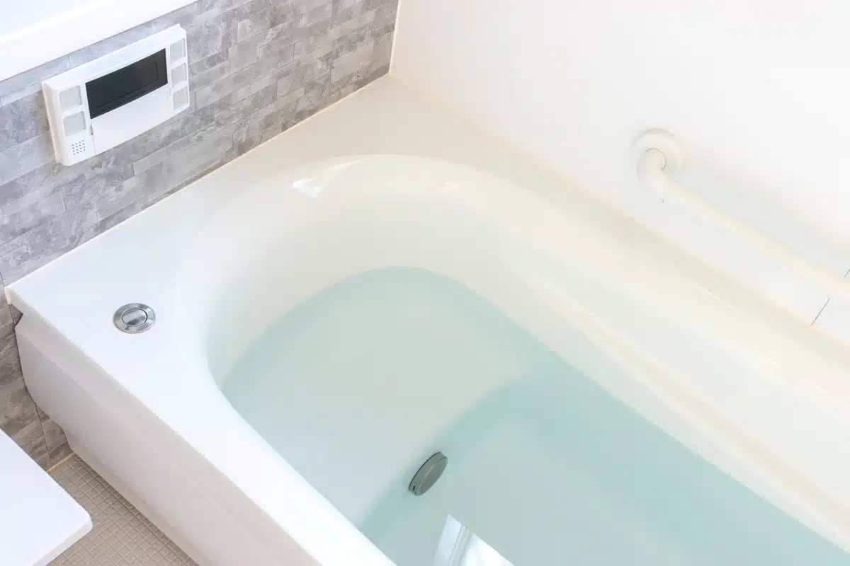 bathtub with water in it