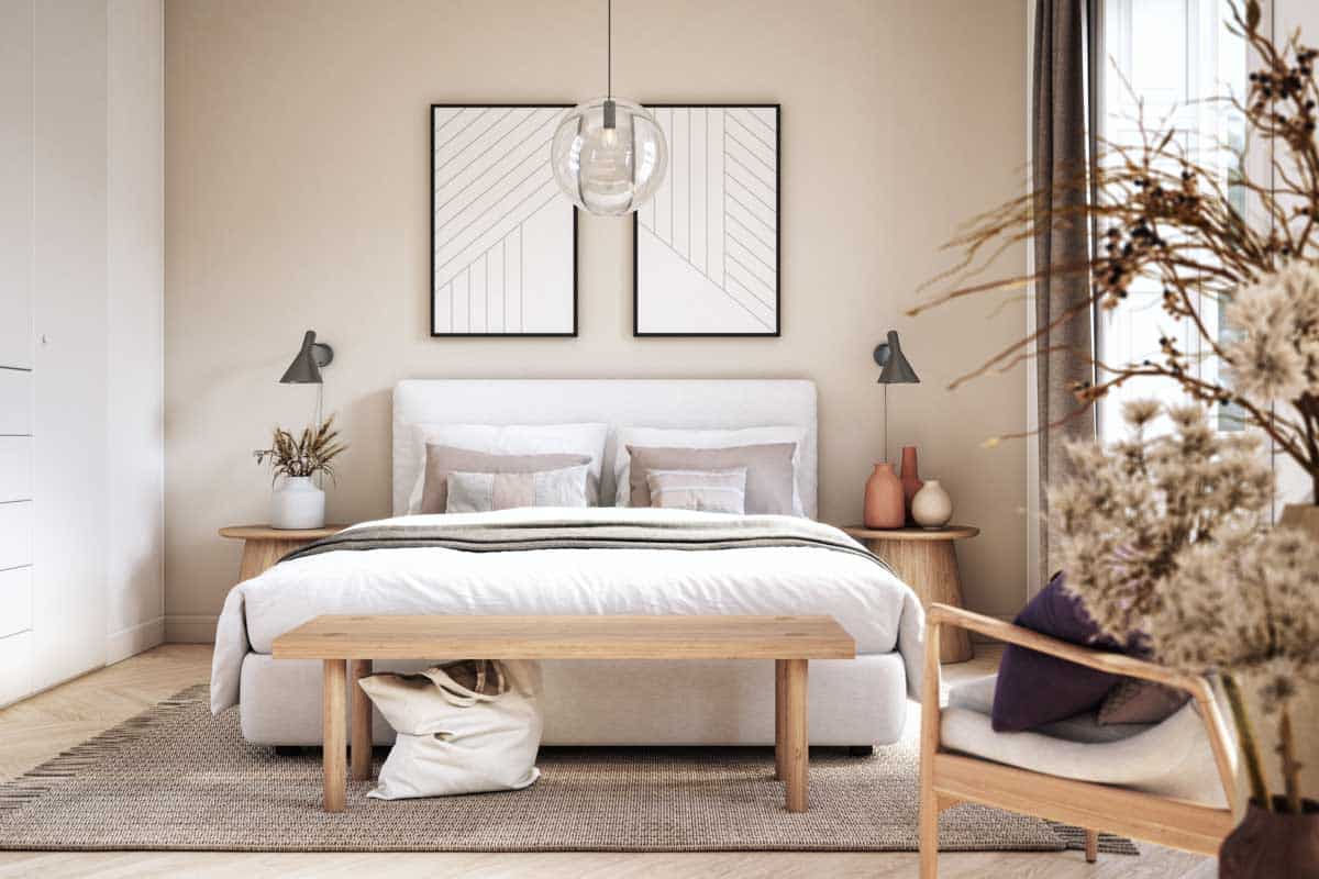 bedroom with beige wall and pendant light