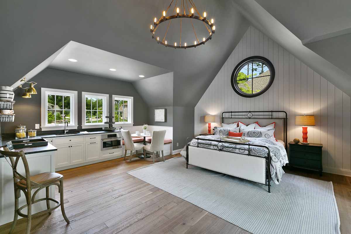 bedroom with gray walls and windows
