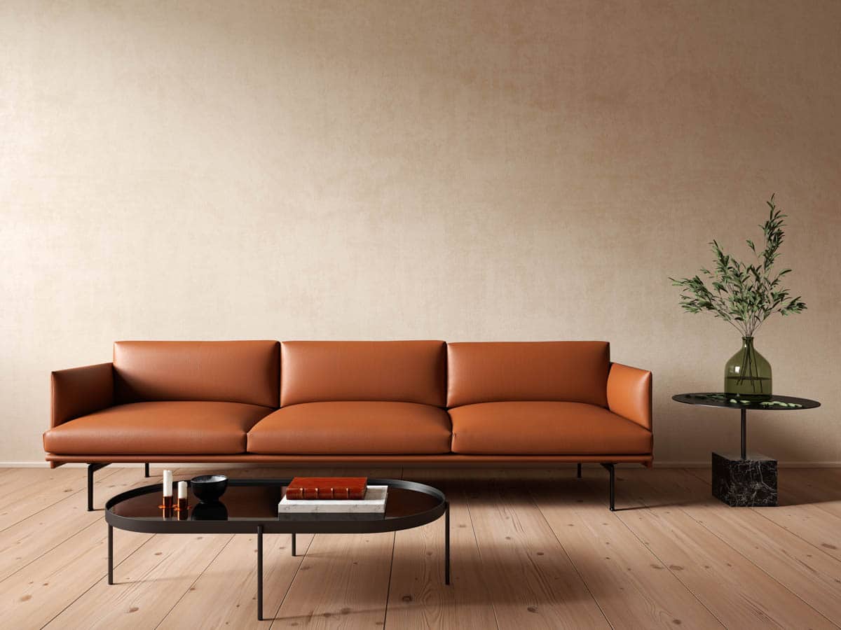 beige wall living room with burnt orange couch