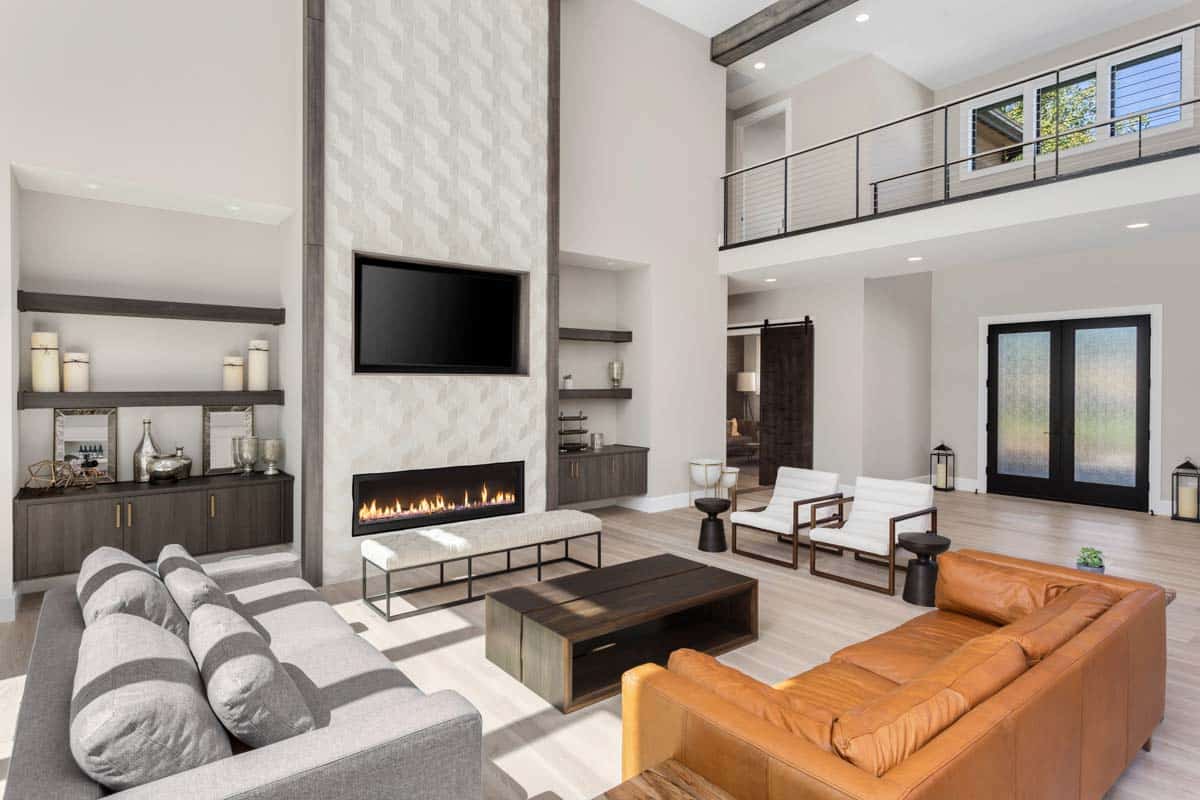 modern living room with gas linear fireplace and wavy tile design