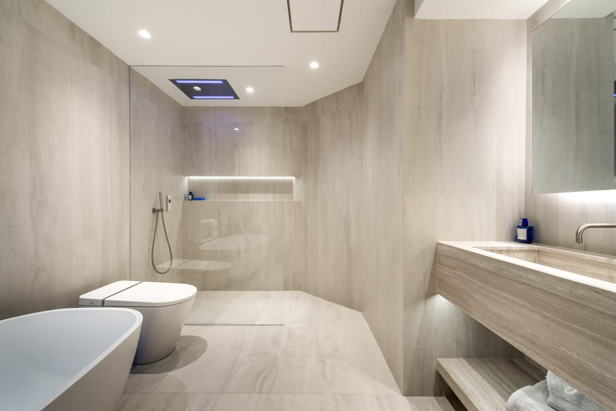 bathroom with ceiling lights and toilet