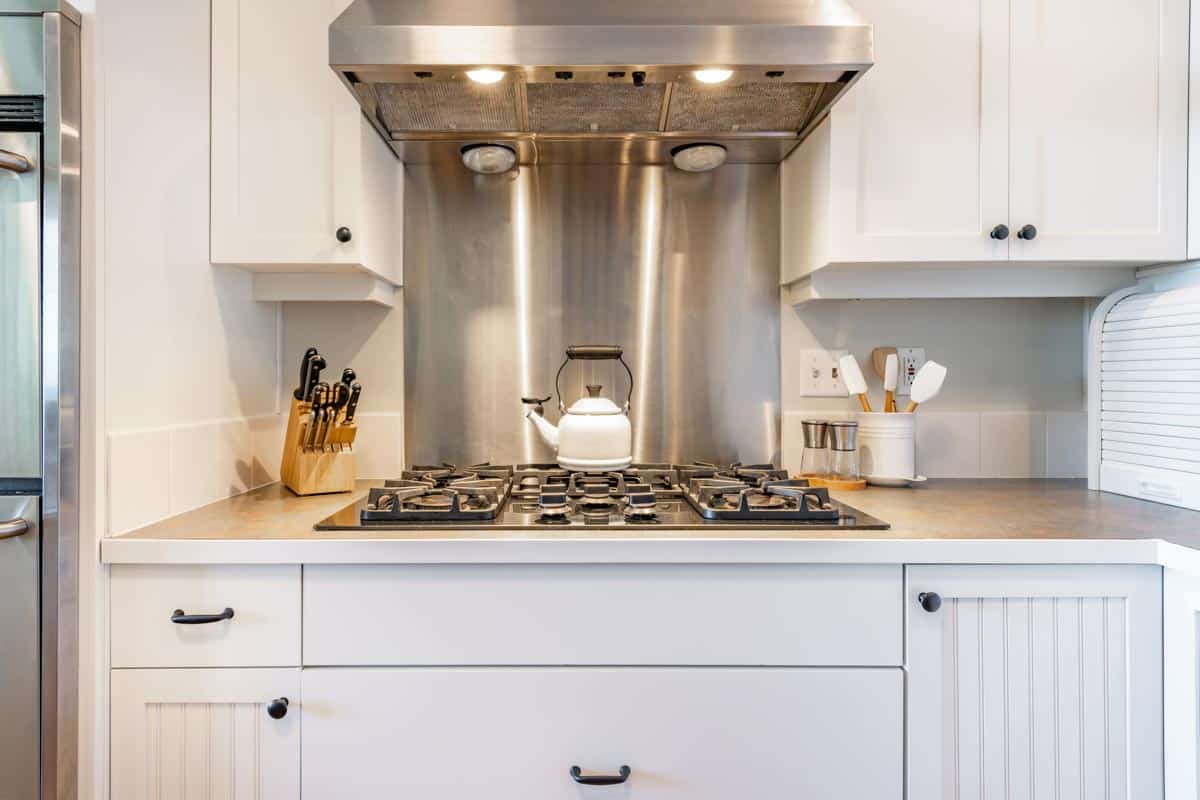 kitchen with peel and stick backsplash steel design