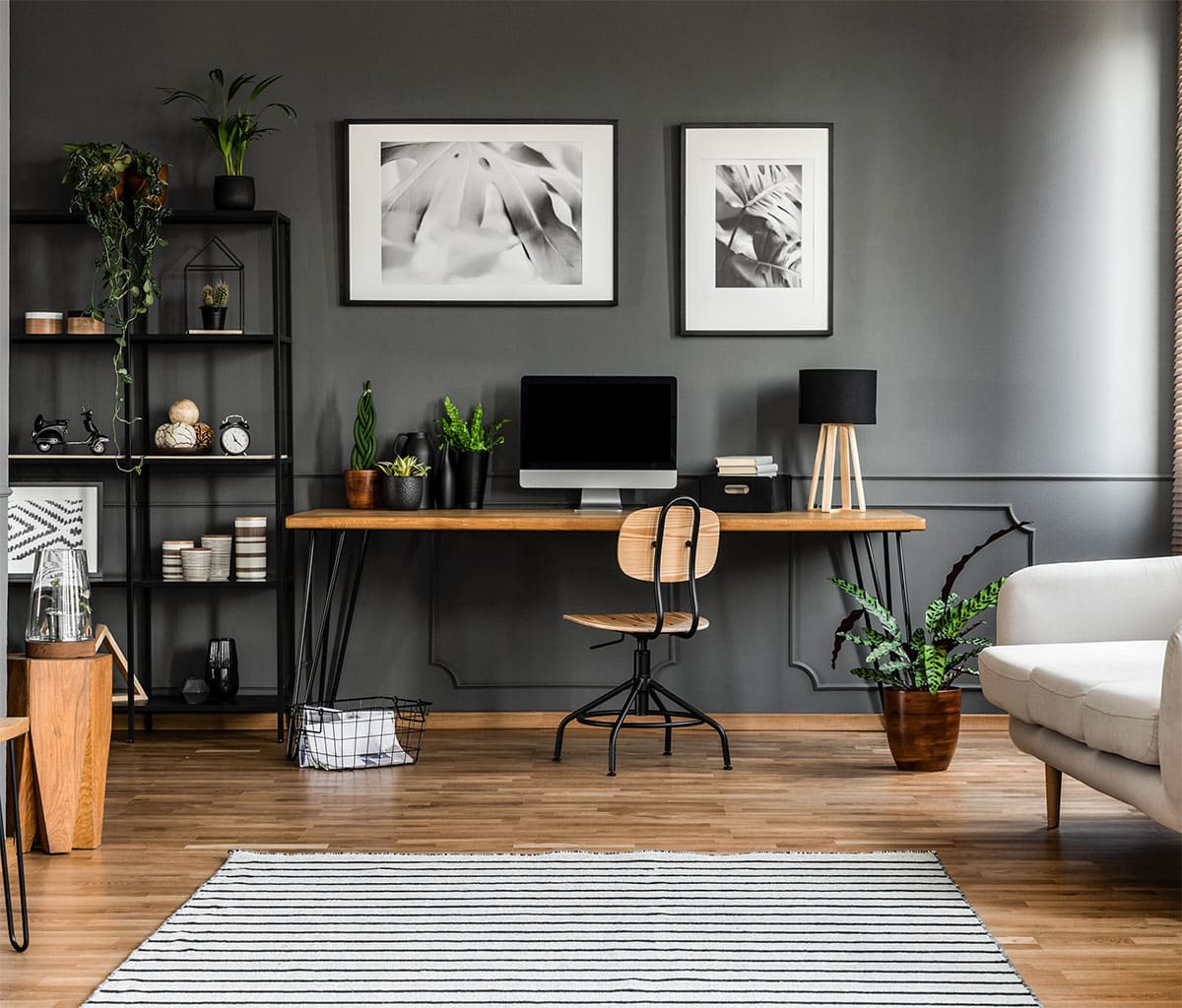 Desk with dark gray wall wooden floor wooden chair