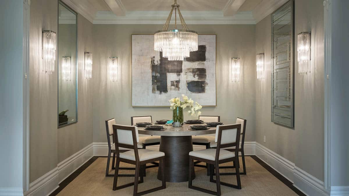 Dining area with wall sconce lights and chandelier