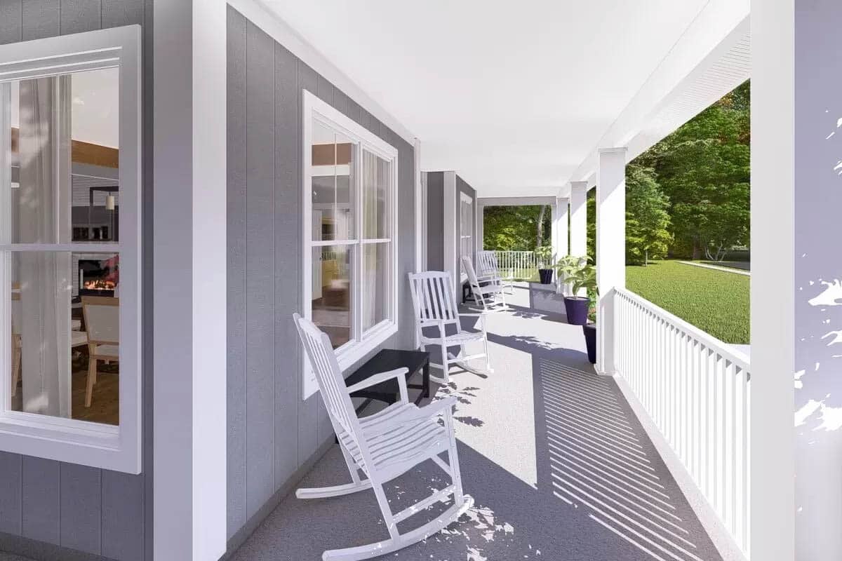 Farmhouse front porch with gray paint and rocking chairs