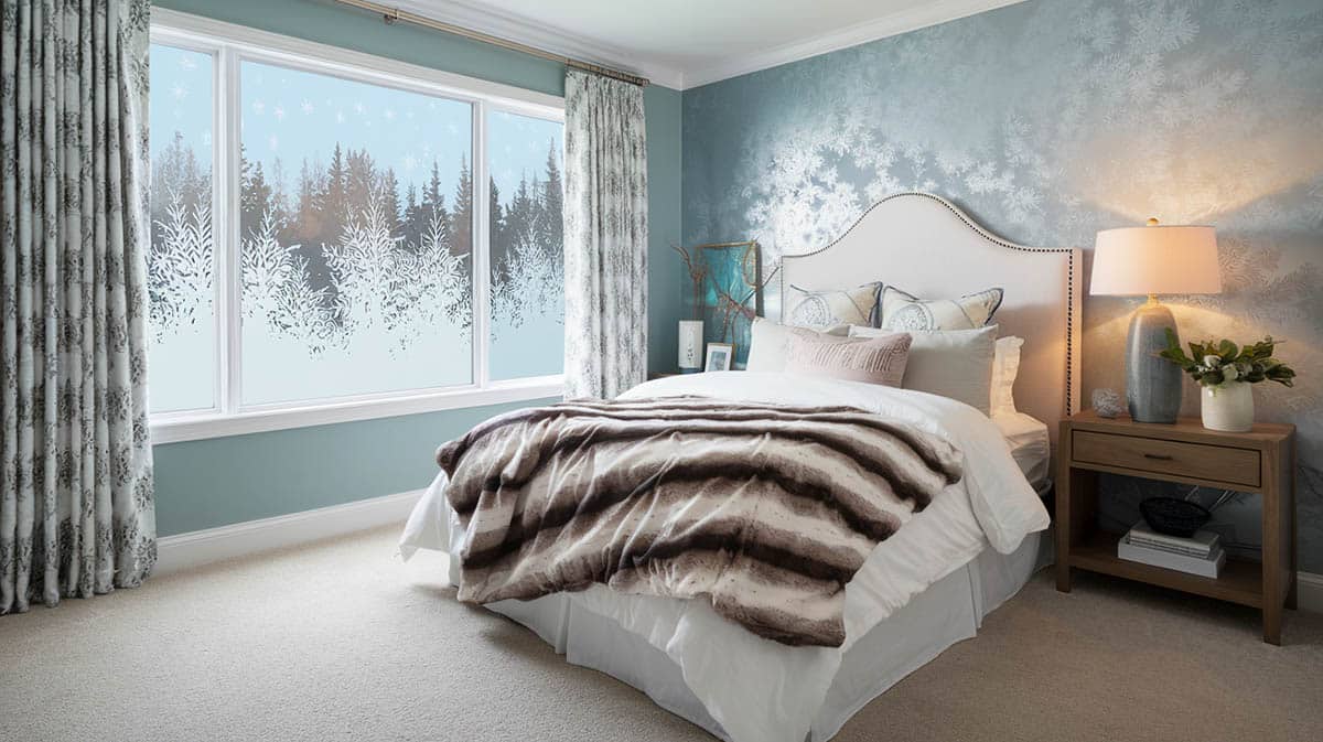 Bedroom with decorative window film for frosty look