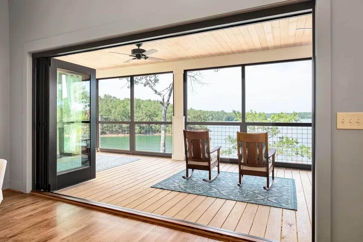 Panoramic doors to porch and lake