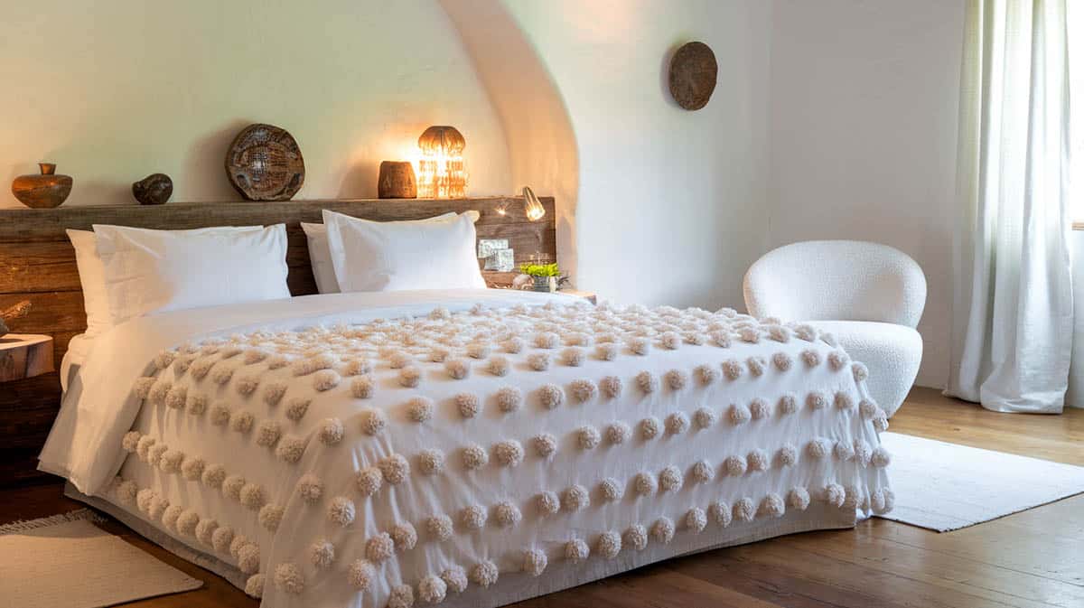 Bedroom with white snowball bedding comforter