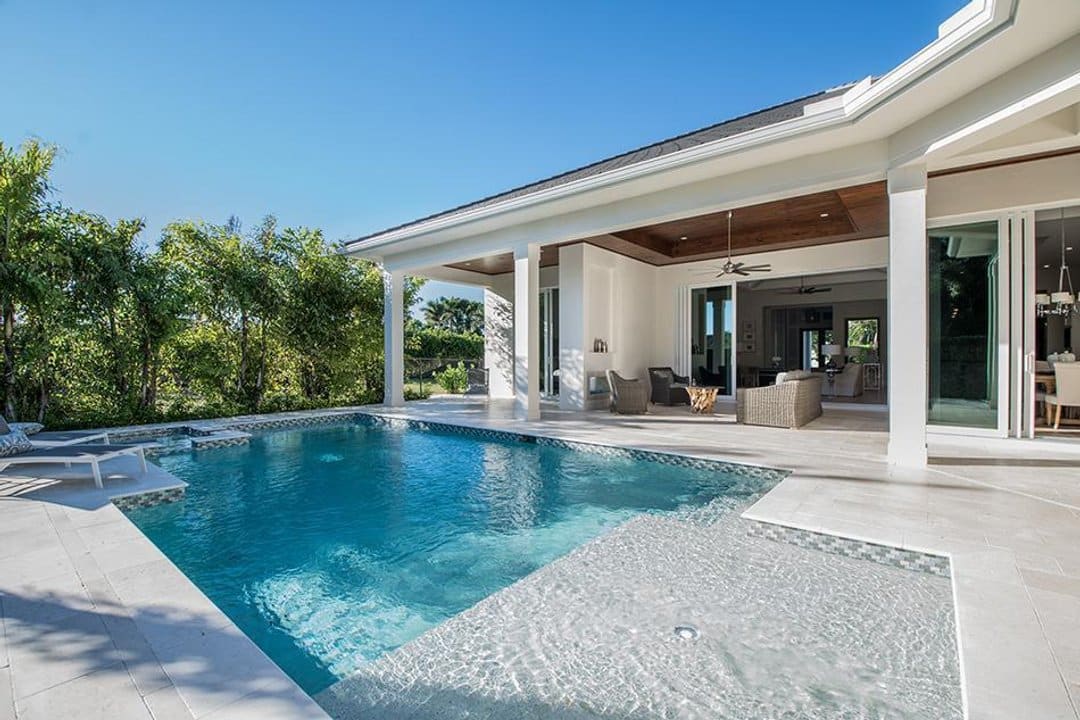 Backyard pool with sun shelf