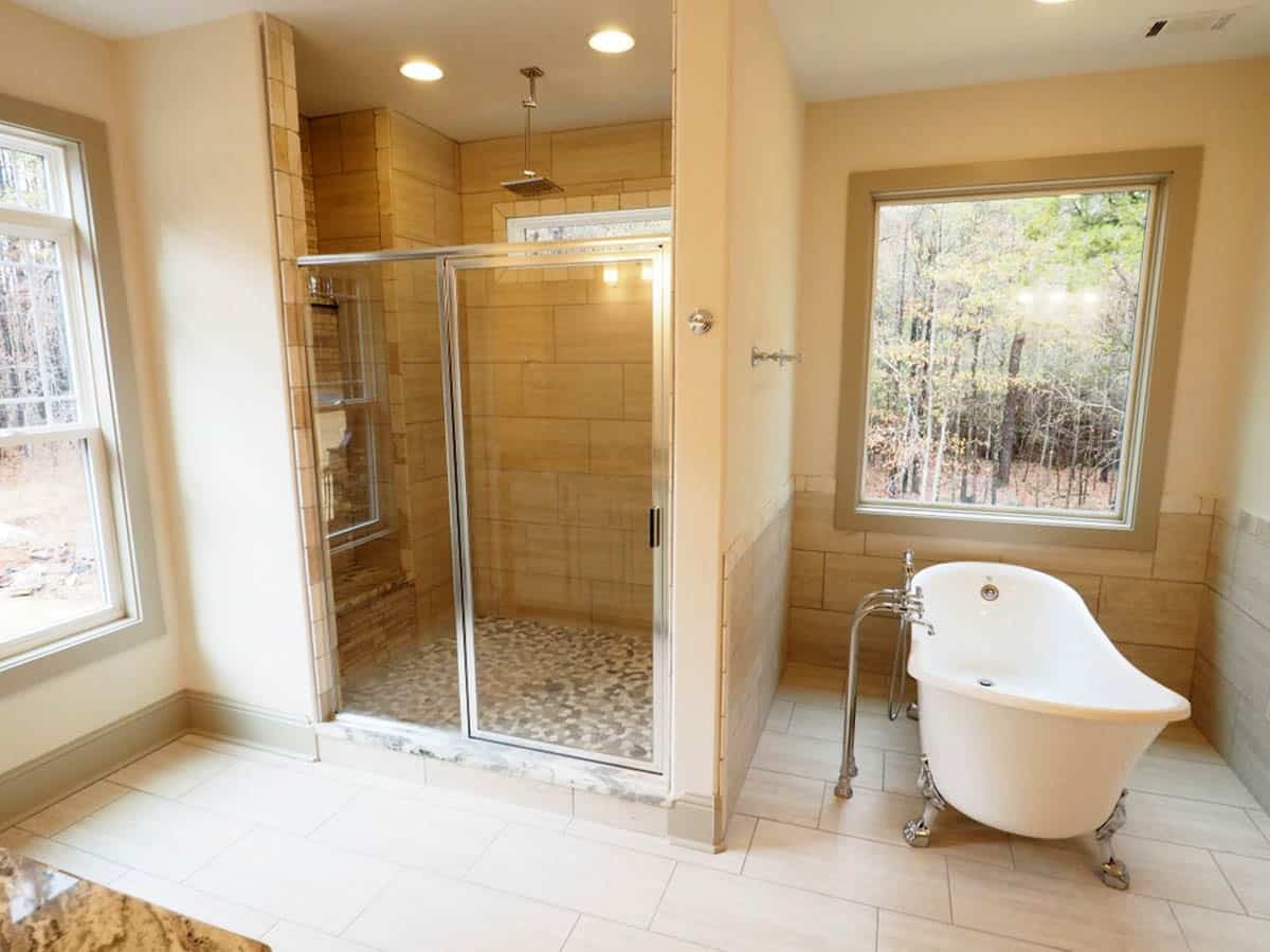 Bathroom with clawfoot tub and large rainfall shower