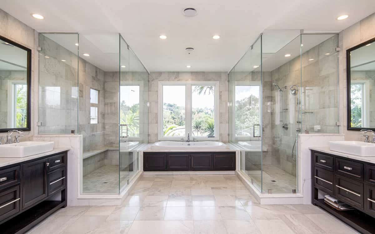 Bathroom with his and hers shower