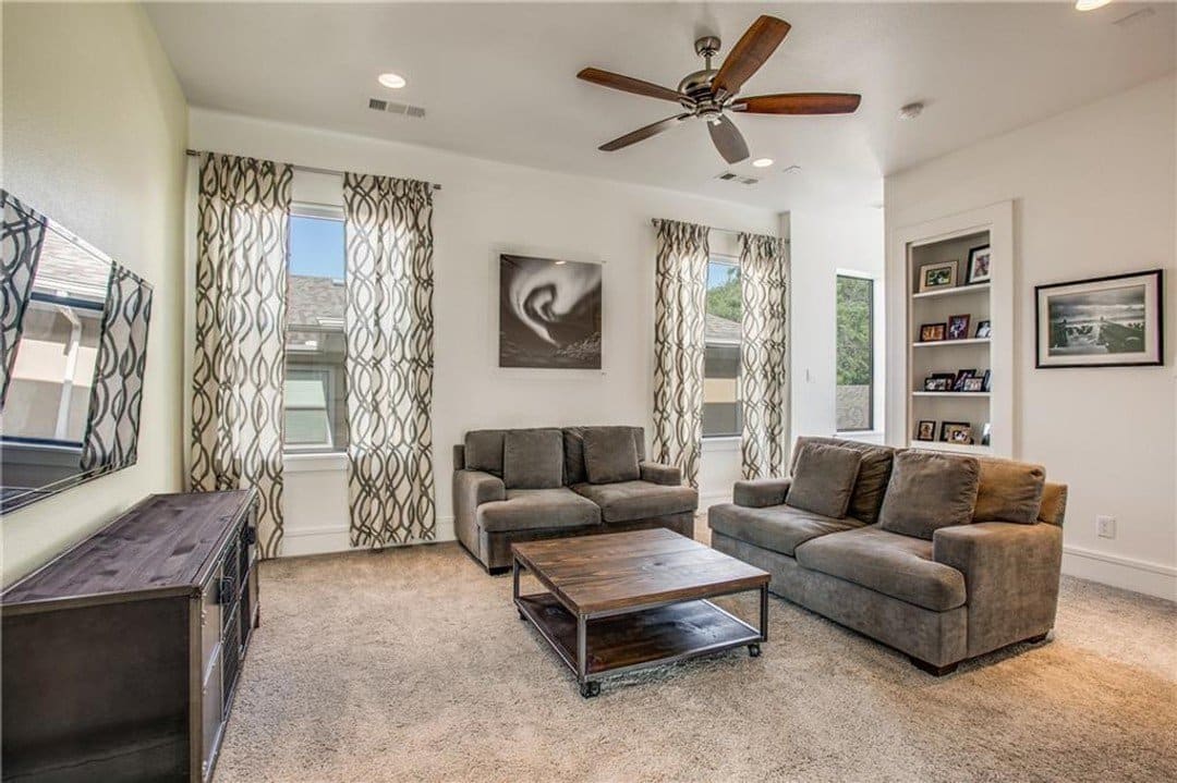 Family room with comfy couches and built-in storage