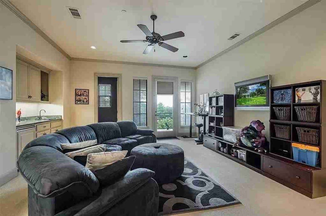 Family game room with balcony and wet bar