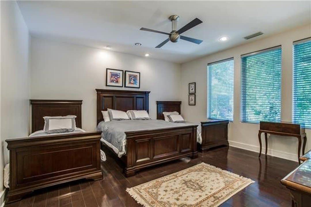 Large family guest bedroom with multiple beds