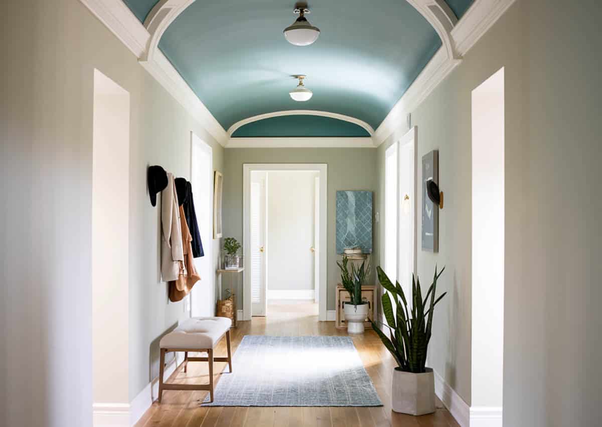 Hallway with painted ceiling in light aqua blue