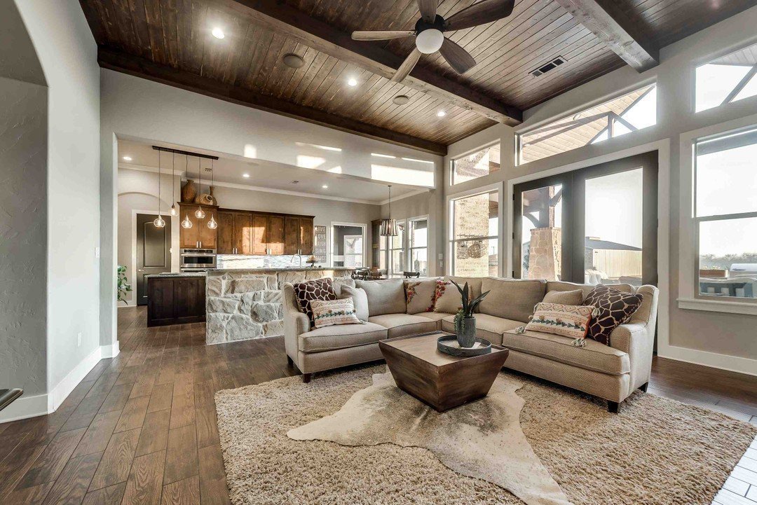 Rustic modern living room with wood plank ceiling