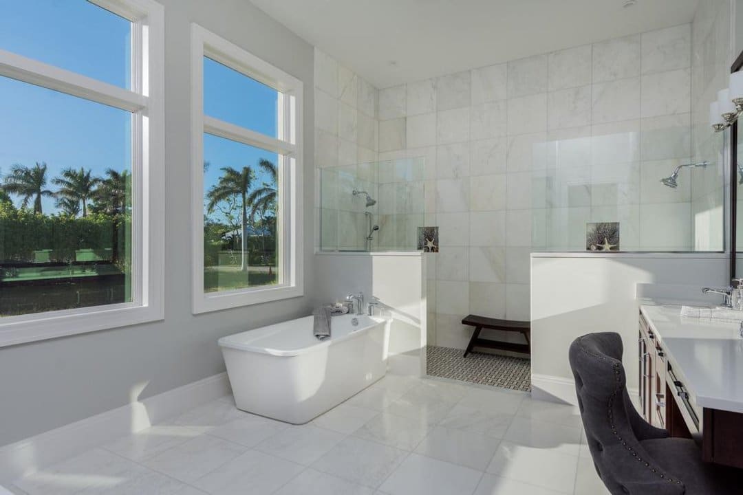 Luxury bathroom with his and hers showers