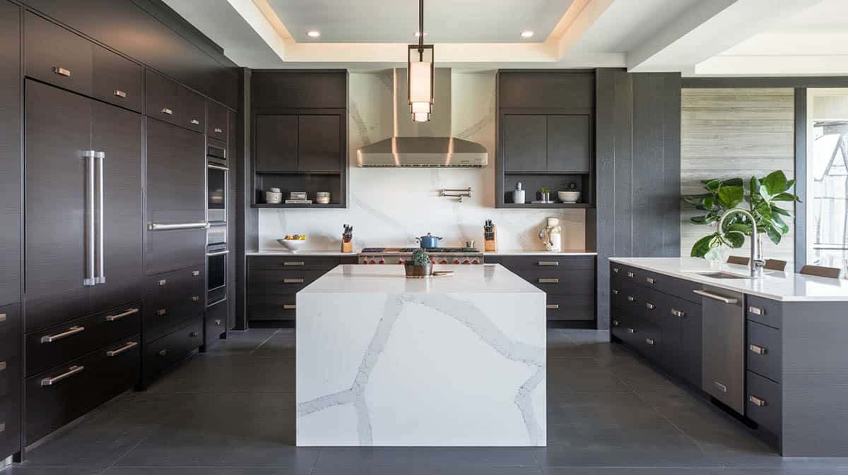 Contemporary design kitchen with espresso brown cabinets and waterfall quartz island 