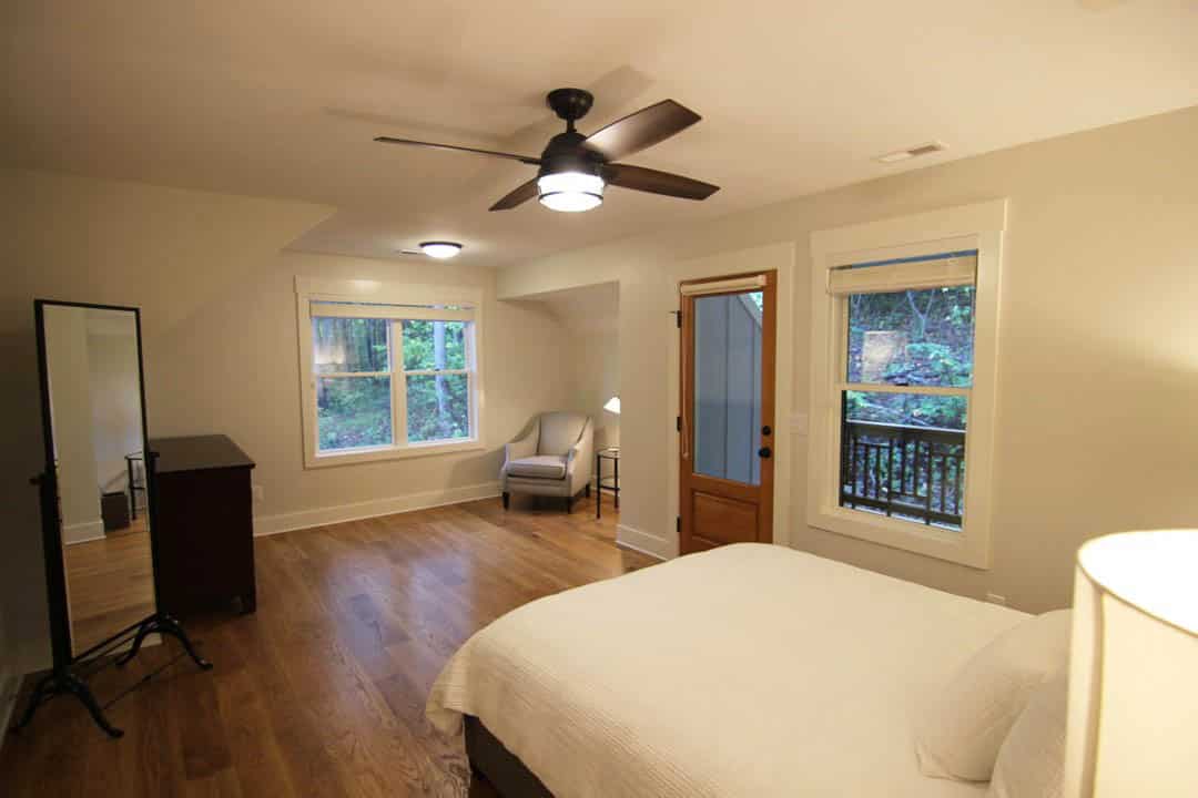 Master bedroom suite with balcony exit