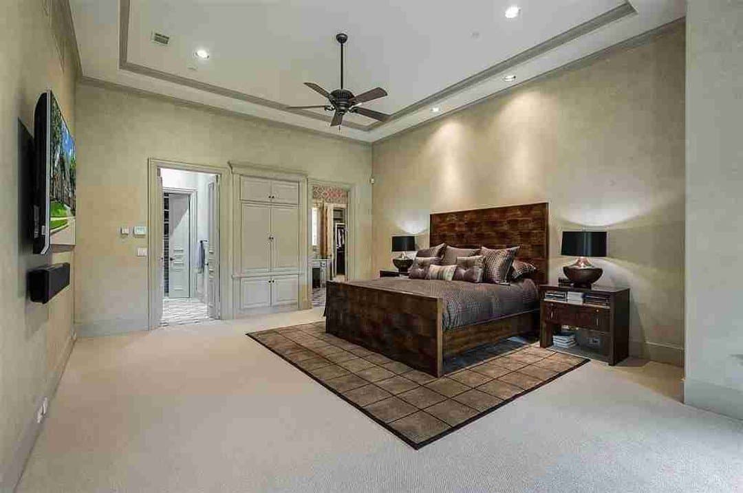 Mediterranean master bedroom suite with textured walls