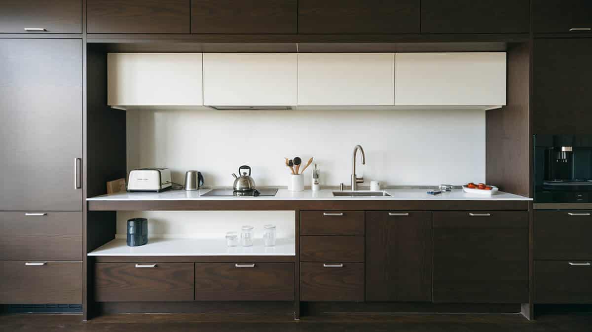 Minimalist kitchen with white and brown flat panel cabinets