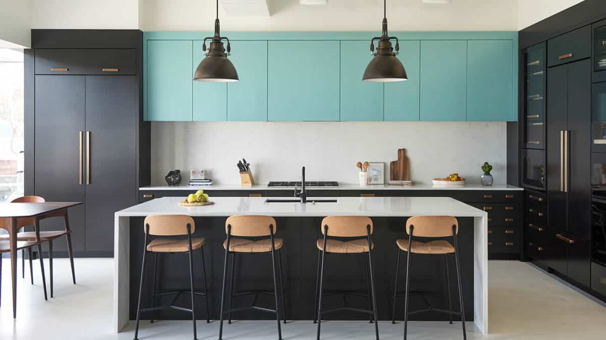 Modern high contrast kitchen featuring turquoise and black cabinets