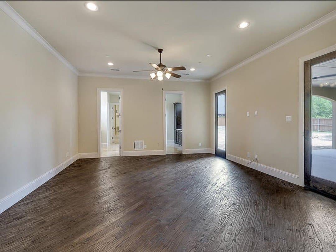 Master suite bedroom with access to outdoor patio