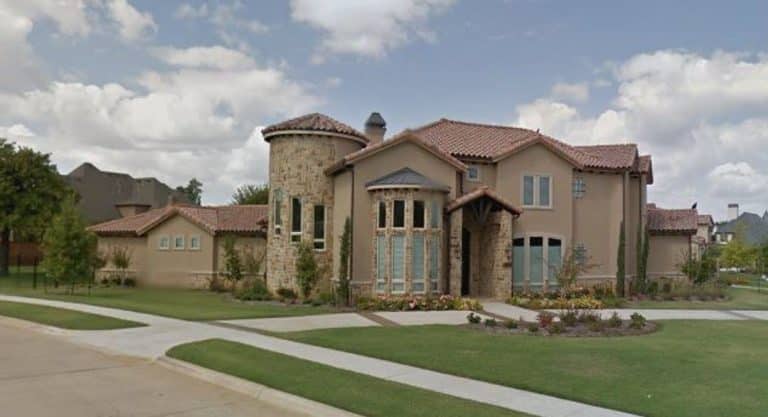 Luxury Mediterranean House Plan with 3-Car Garage & High Ceilings