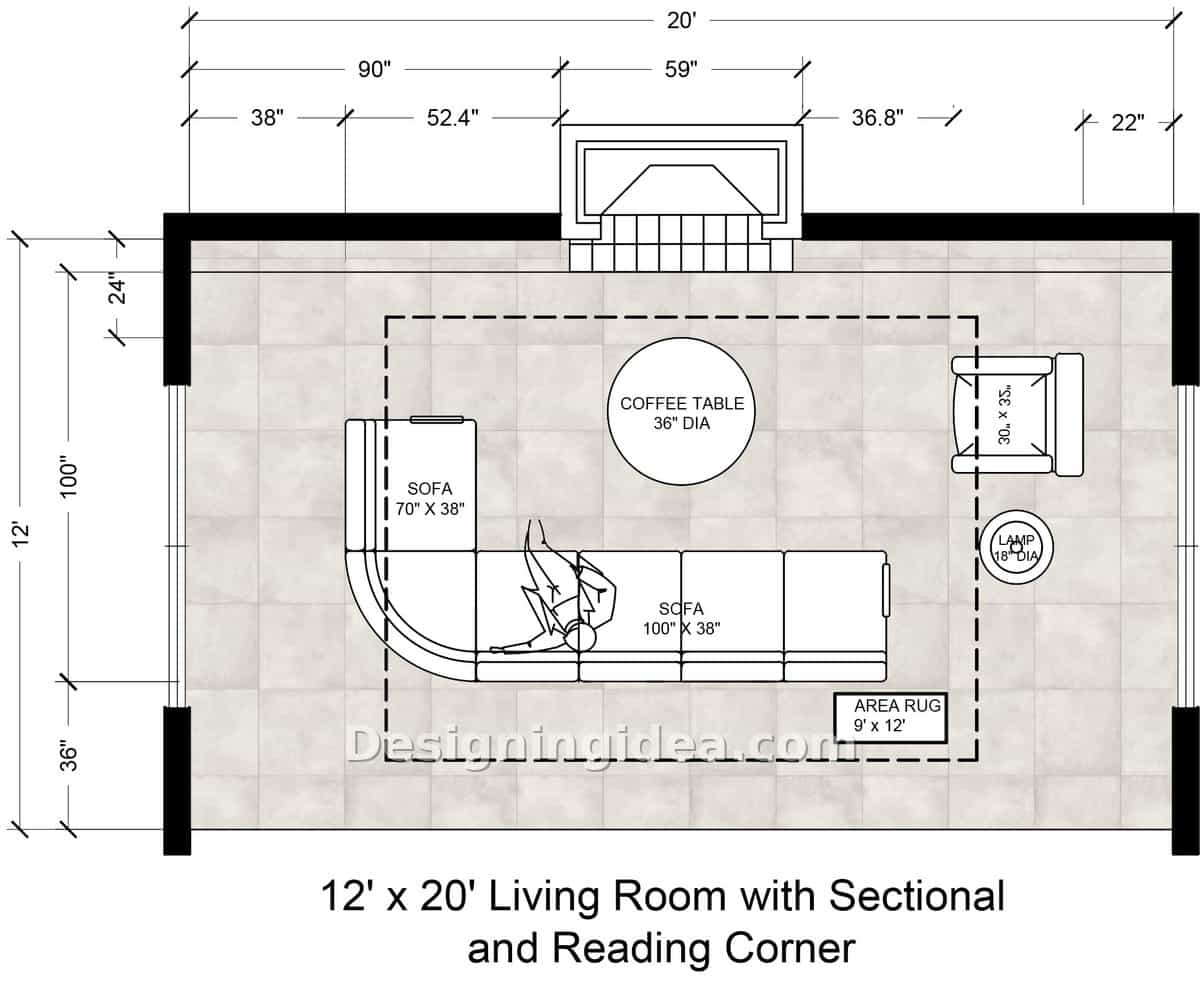 Sectional tucked into corner beside round coffee table and a separate reading chair