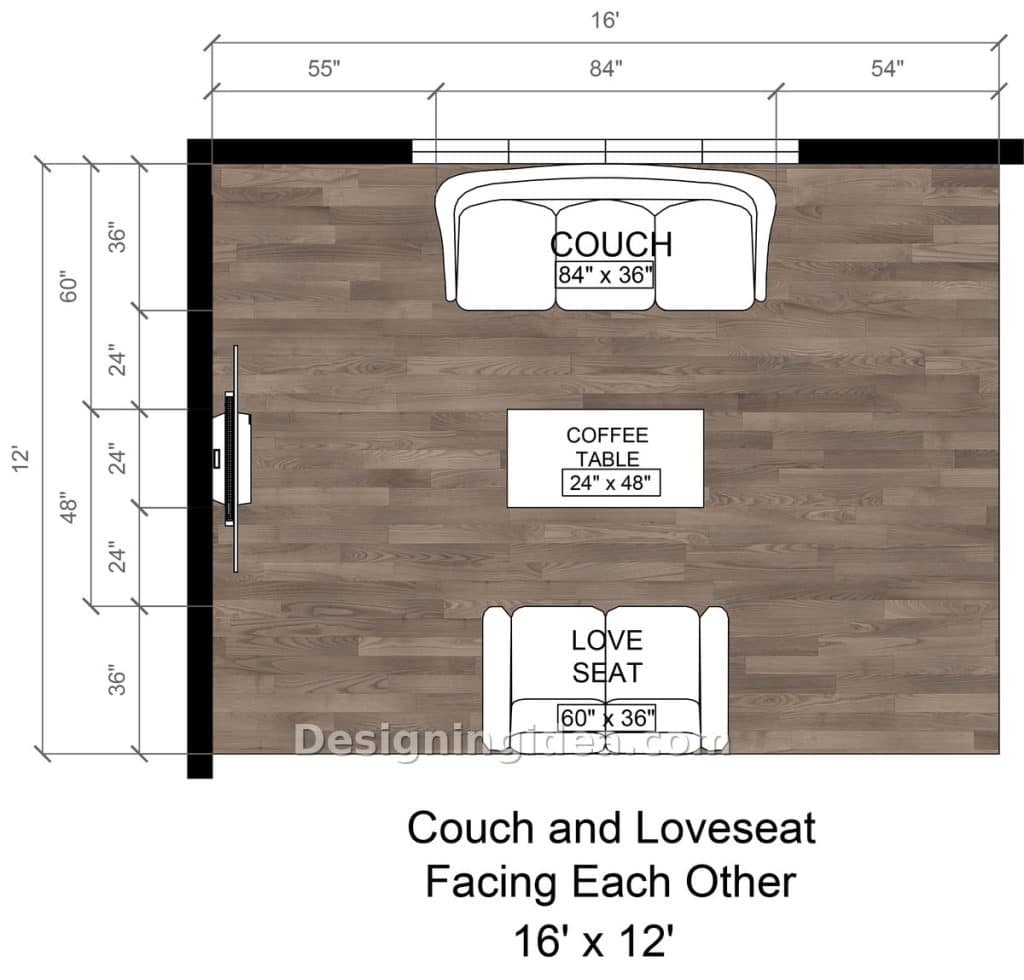 Sofa under a window and loveseat opposite with television on the side wall